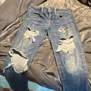 Distressed Blue Jeans